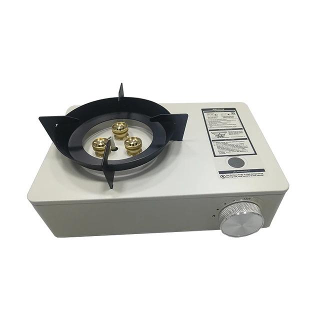 Portable gas stove with a strong flame and wind resistance, featuring even heat distribution and a bag for easy carrying